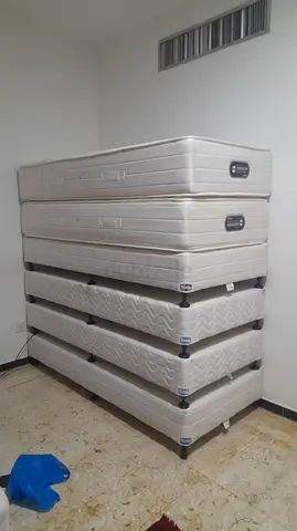 Used single mattresses with bases - set of 4 (good condition)