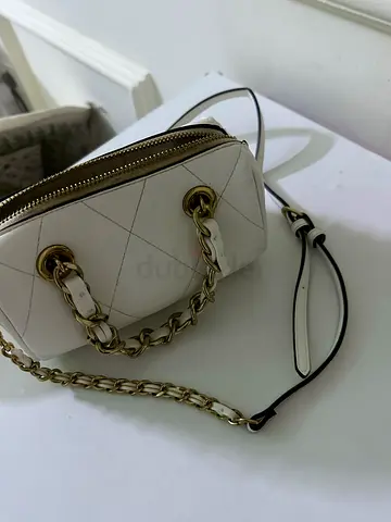 White quilted chain-strap shoulder bag