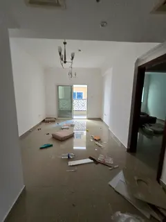 One-bedroom apartment with a living room and parking included in Muwaileh Commercial.