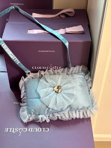 Light blue ruffled satin womens shoulder bag with crystal flower