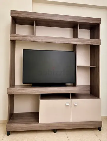 Modern wooden entertainment TV unit with shelves and cupboards