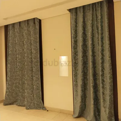 Pair of blue patterned floor-length curtains - ready to hang 12 feets each.. 1 pair