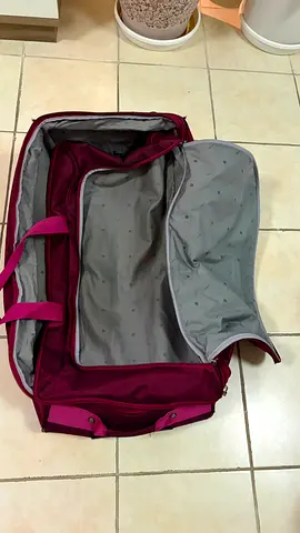 Maroon Duffel Bag - Medium Travel/Weekend Bag, expandable and wheel trolley type Good Condition