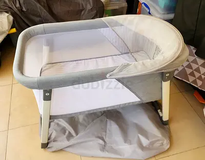 Comfy Bumby Travel Bassinet for Baby - Rocking  Sturdy Cradle - Includes Carry Case, Mosquito Net