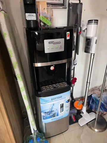 Used Bottom-Load Water Dispenser Cooler - Black/Silver, Good Working Condition