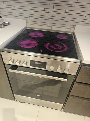 Bosch Built-in Oven / Cooker - Model HI3F3R. Excellent condition with added wheels.