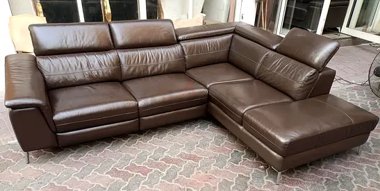Brown leather L-shaped sectional sofa with adjustable headrests