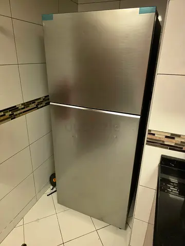 Stainless Steel Fridge - Good Condition, Spacious Top Freezer