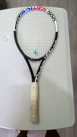 Tennis racket in good condition —  Technifibre T-fit 290 power with razor soft strings.
