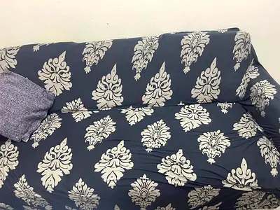 Purple patterned 3-seater sofa with removable cover