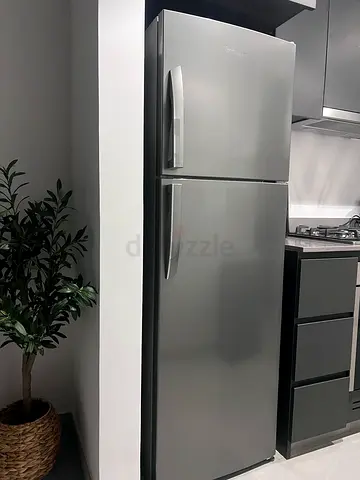 Double-door stainless steel refrigerator - good condition