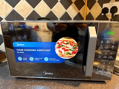 Midea 29L Microwave Oven with Grill (Black/Silver) - Model EG9P032MX