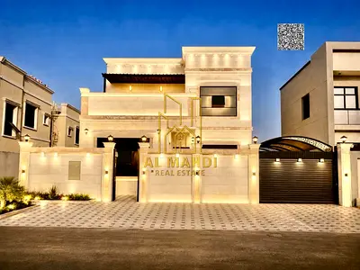 4 villas, each with four master bedrooms, a living room, a majlis (formal sitting room), a kitchen,