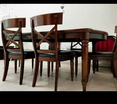 Classic Dark Wood Dining Table with Cross-Back Chairs