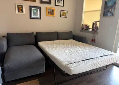 Modern Gray L-Shaped Sofa Bed with Pull-Out Mattress