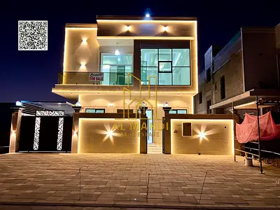 Villa for sale in Ajman, Al Helio 2 area - 5 bedrooms, majlis, 2 living rooms, and maid's room. Freehold. Price includes registration fees and is nego