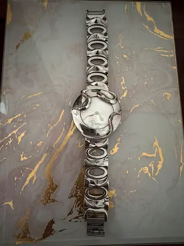 Silver womens bracelet watch with circular link design - preowned