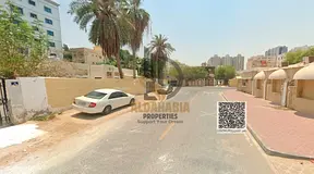 Demolishable Arabic House for Sale in Al Rumailah, Ajman | Corner Plot with G+4 Investment Permit