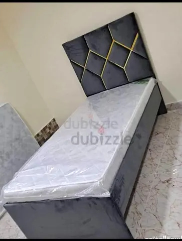 Single grey upholstered bed with headboard brand new