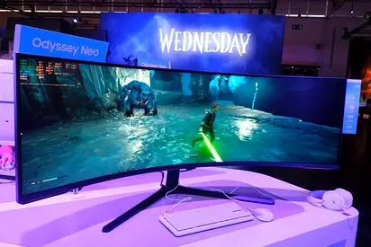 The Samsung S57CG952N (often branded as the Odyssey Neo G9 G95NC) is a massive 57-inch super-ultrawi