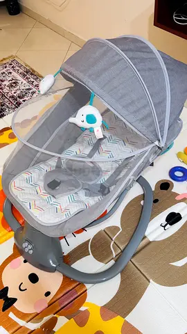 Lightweight baby rocker with canopy and toy - good condition