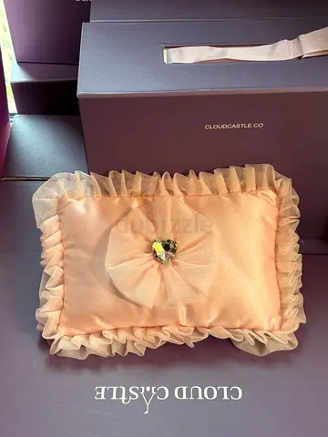pink ruffle clutch bag with crystal detail
