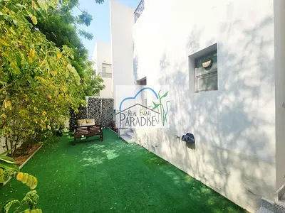 Away from fly zone/ private entrance 3 bedrooms/tv lounge/maids room/private back garden/ shared swimming pool / 5 car paring space/for rent in mirdif