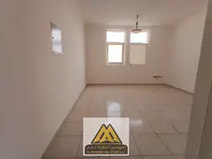 Annual 1BHK with balcony in Al Nuaimiya 2, spacious, central AC, family building, AED 24,997 in 4 pa