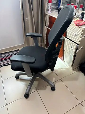 Ergonomic Office Chair with Armrests and Wheels - Good Condition