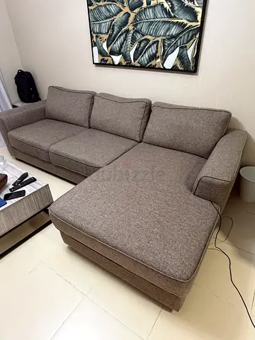 L-shaped brown fabric sofa - good condition - used 6 months only