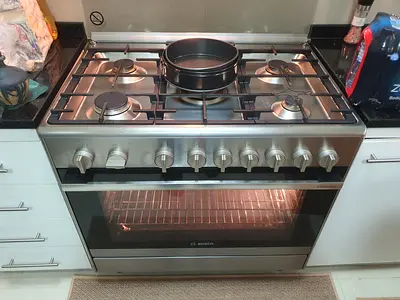 Bosch stainless steel 5-burner gas stove with oven - good condition 90cm