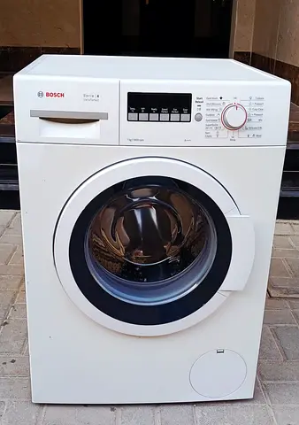 Its front load 7kg Bosch washing machine, white color. Condition is good working.