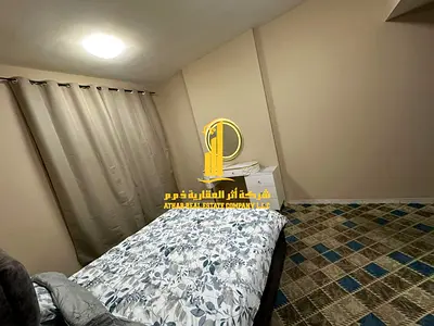 Second tenant, two bedrooms and a living room, fully furnished, for monthly rent in Al Rashidiya 3, close to all services.