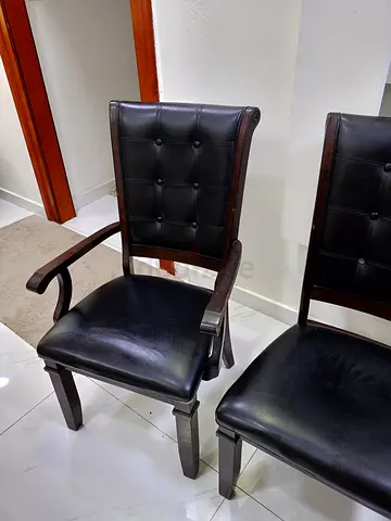 Elegant Black Faux Leather Armchairs with Tufted Backs