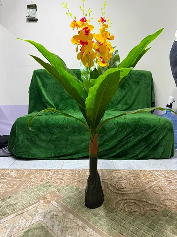 Tall artificial orchid floor plant in decorative vase - good condition