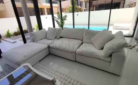 Marina home feather 🪶 filled modular sofa with ottoman for sale