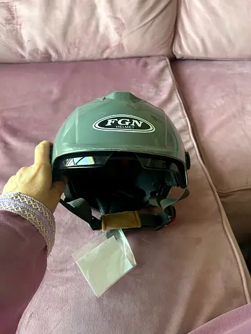 New Cycling / Escooter helmet. Visor and adjustable. Size medium.
