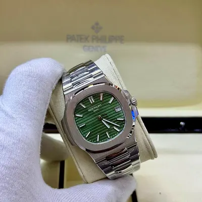 Elegant Patek Philippe Nautilus silver and green metal watch