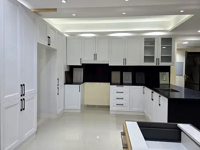 White Alumnuim L-shaped Kitchen Cabinet Set with Black Granite Countertops