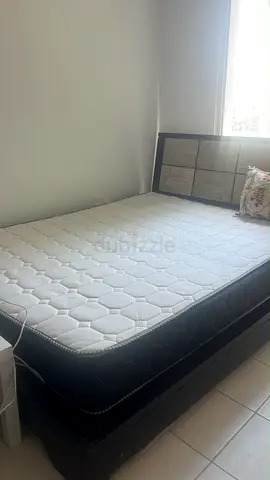 Double bed frame with mattress — good condition, storage base