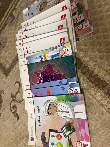 Set of Grade 1 Arabic Primary School Textbooks (multiple workbooks and booklets)