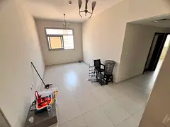 Annual 2 Bedroom Apartment for Rent in Al Jurf 3 with Parking and Central AC