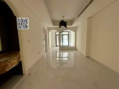 2BR apartment for annual rent in Al Tallah 2, Ajman, first occupancy, with a majlis, 3 bathrooms, ce