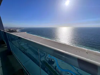 A luxurious and modern residential opportunity in The Residence Towers In a charming and strategic location With a full and direct sea view from th