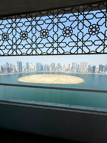 Three-bedroom apartment with a living room for rent on Al Mamzar Corniche; area of 2,000 sq. ft. Includes a maid's room, 4 bathrooms, a balcony p.k