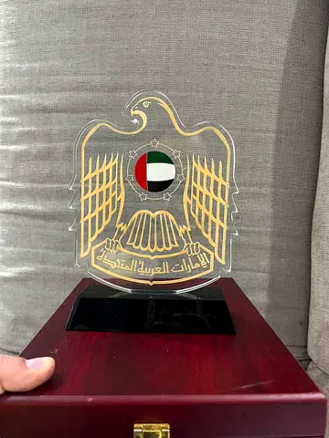 Branded UAE Falcon Acrylic Trophy on Wooden Base