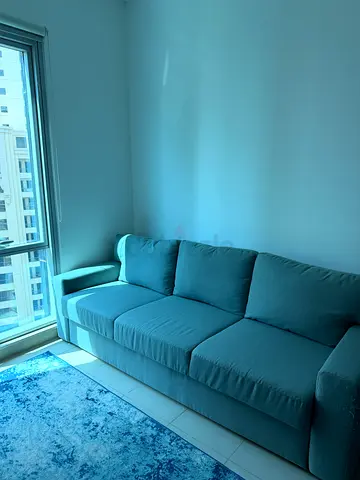 Light grey 3-seater fabric sofa in good condition