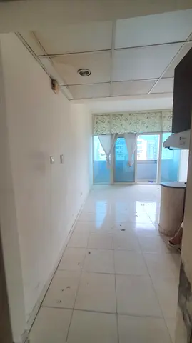Studio in Al Nahda, Sharjah, in a prime location near the Dubai exit. Price: 23,000. Photo shows a sample unit; a video is available.