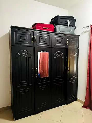 Used four door cupboard for sale