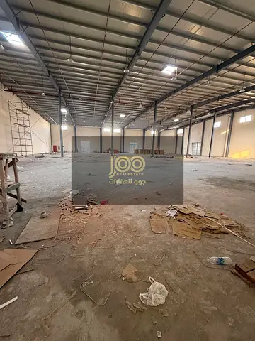 For rent: A large complex in Umm Al Thu'ub area consisting of a warehouse and workers' accommodation, suitable for all activities.